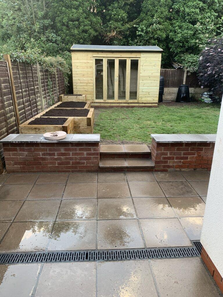patio, shed and raised beds